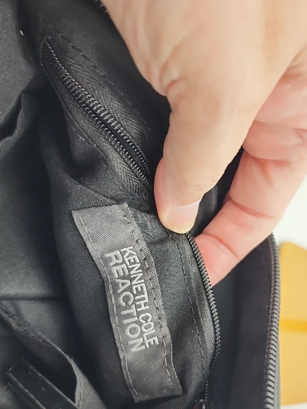 Kenneth Cole Reaction sleek patent